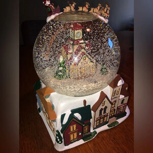 Mr. Christmas Automated Snow Globe is 2000 Large Plays Music 15 Christmas Carols